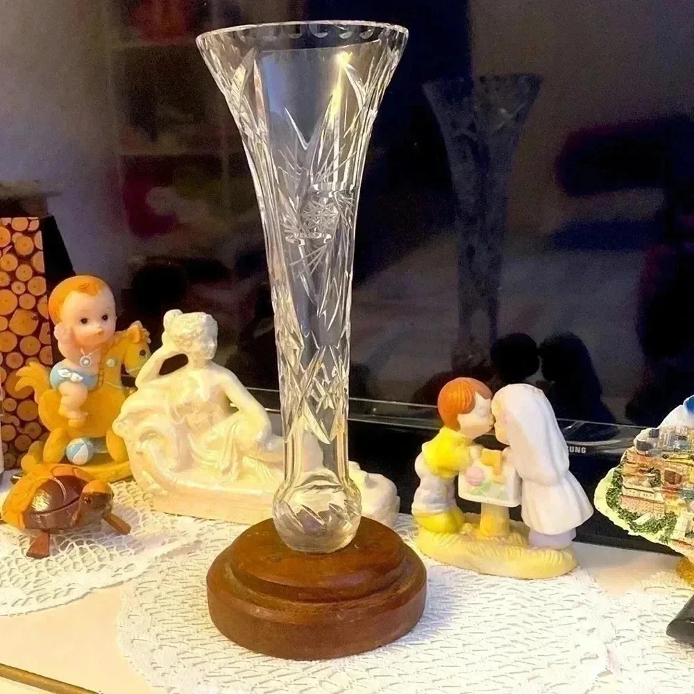 Crystal vase with wooden bottom  stand ( very vintage)